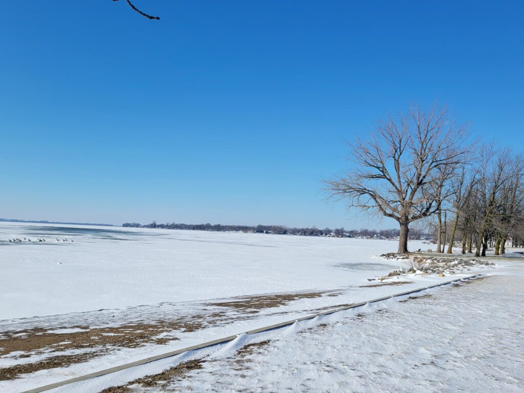 Grand Lake St. Marys shoreline covered in ice and snow