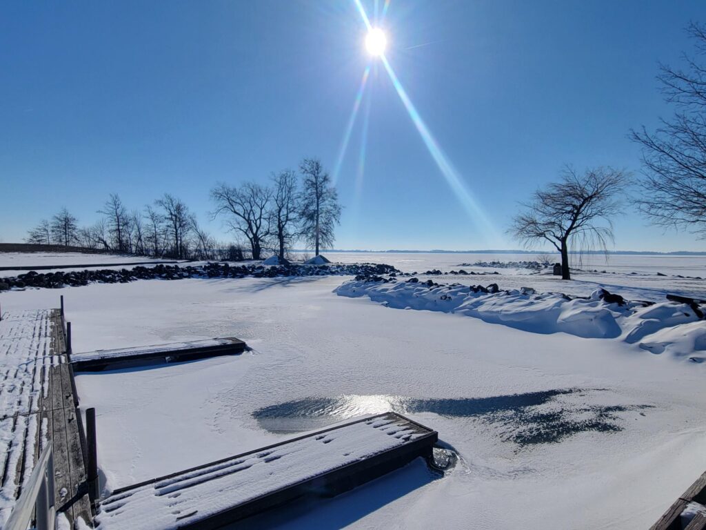 Pier on Grand Lake St. Marys covered in ice and snow